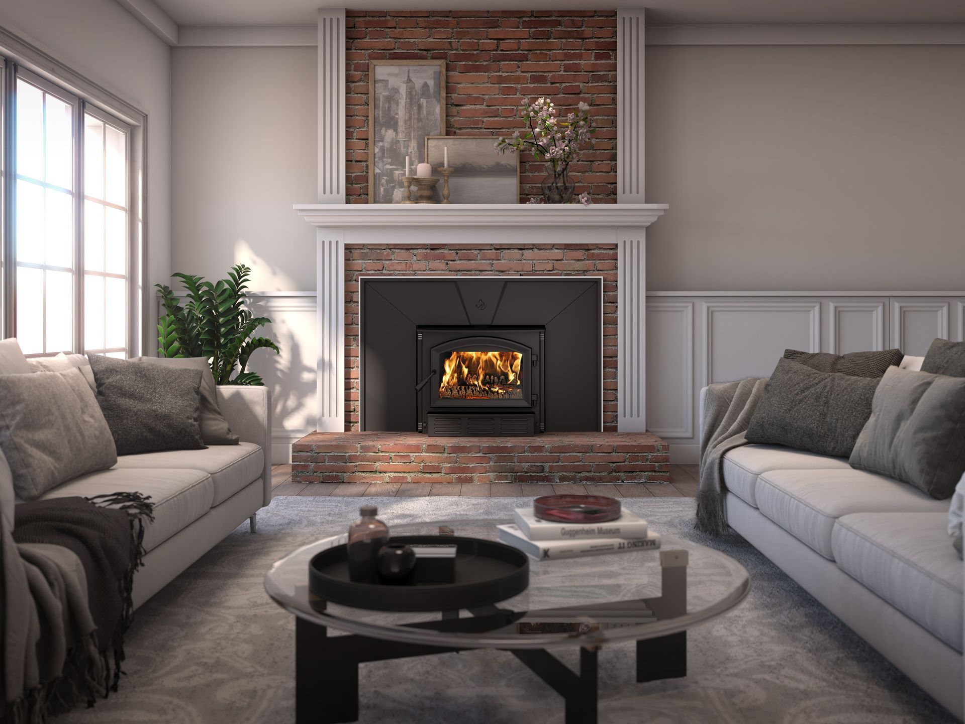 Living room with fireplace, white couches, and glass coffee table