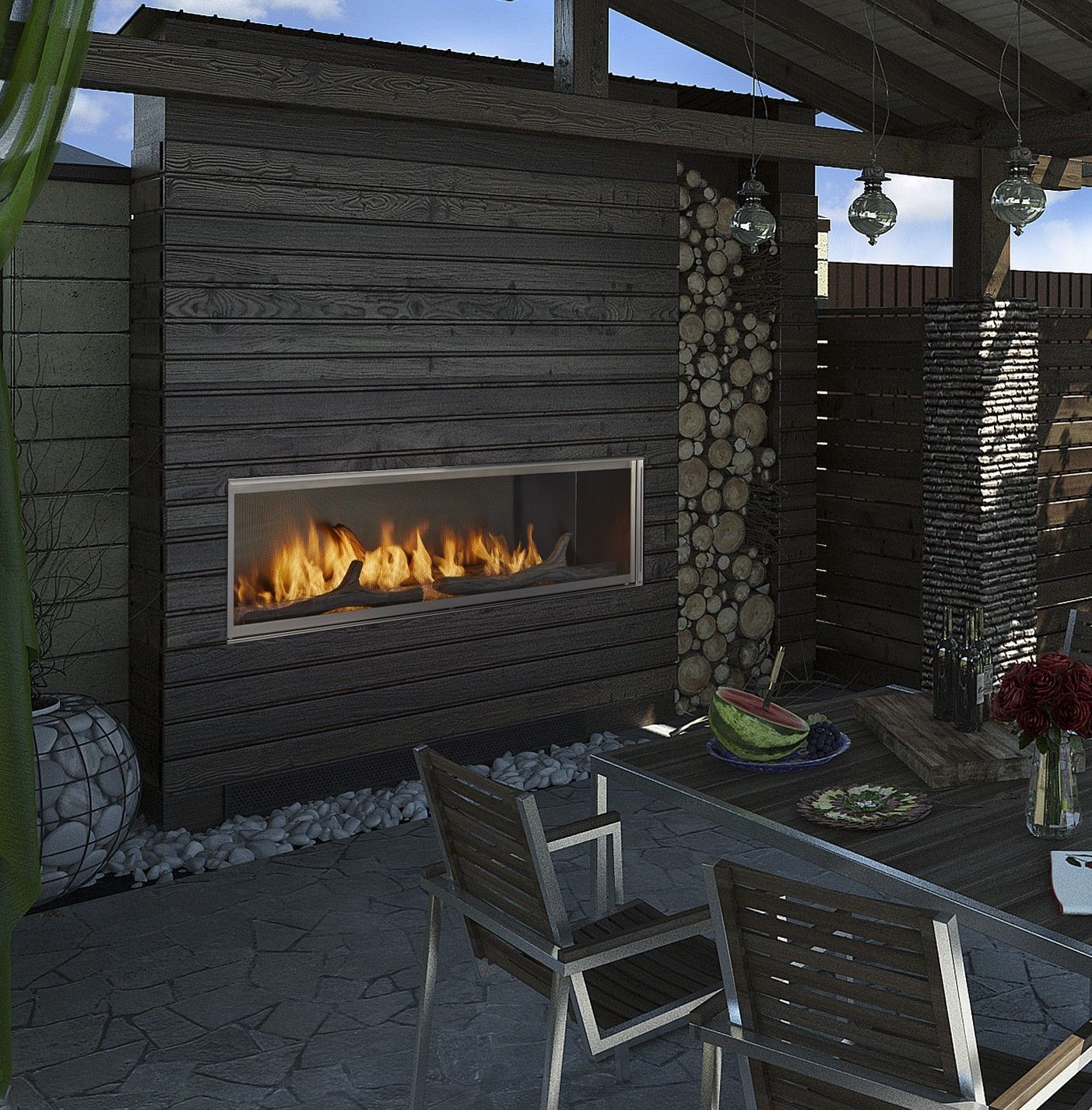 Outdoor fireplace with burning flames, wood-paneled wall, seating, and table set with food and drinks.