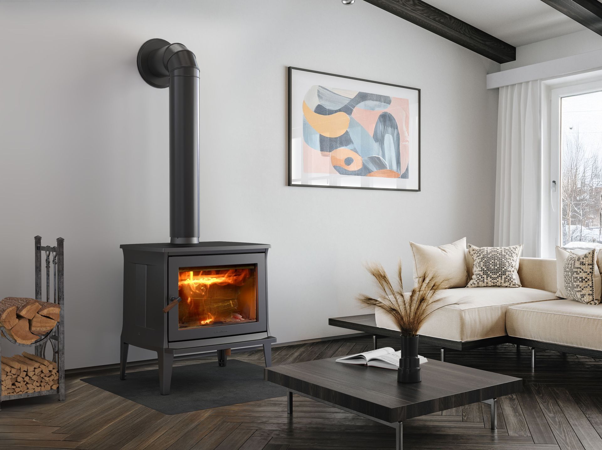 Fireplace in a living room, flames visible, with black pipe, firewood holder, and sofa.