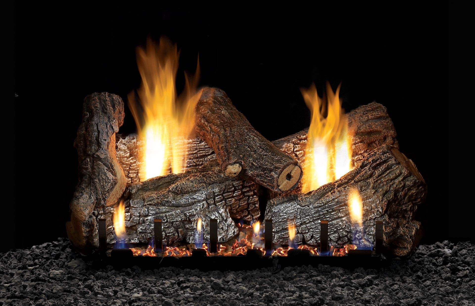 Gas fireplace with burning logs and flames.