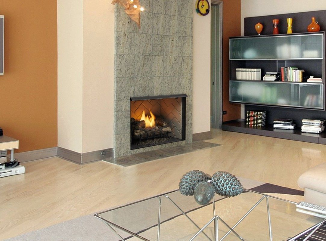 Modern living room with fireplace, built-in shelving, and glass coffee table.