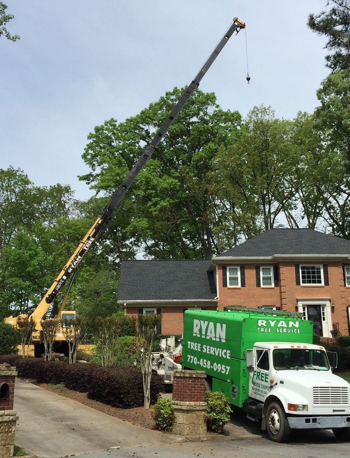 A ryan truck is parked in front of a house