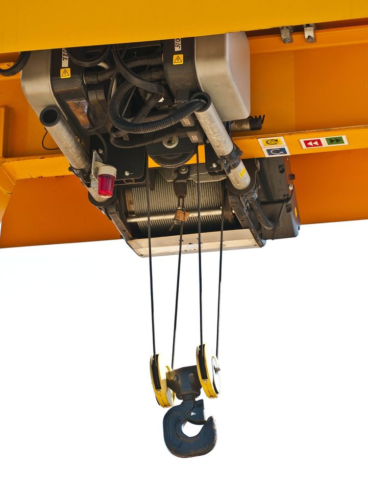 Close-up of industrial crane hook and pulley system