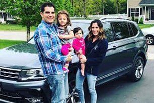 family with new car