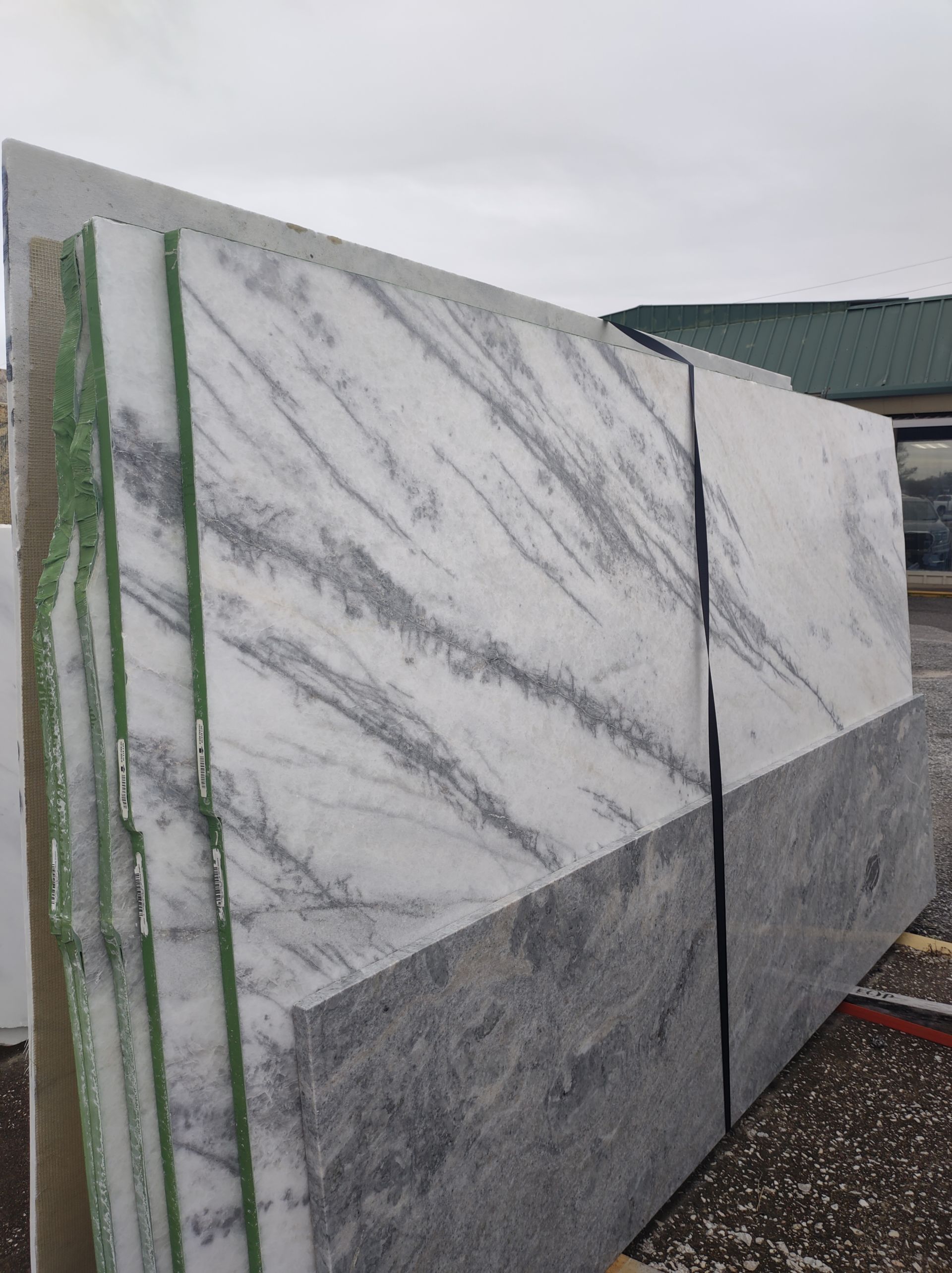 A bunch of marble slabs are stacked on top of each other