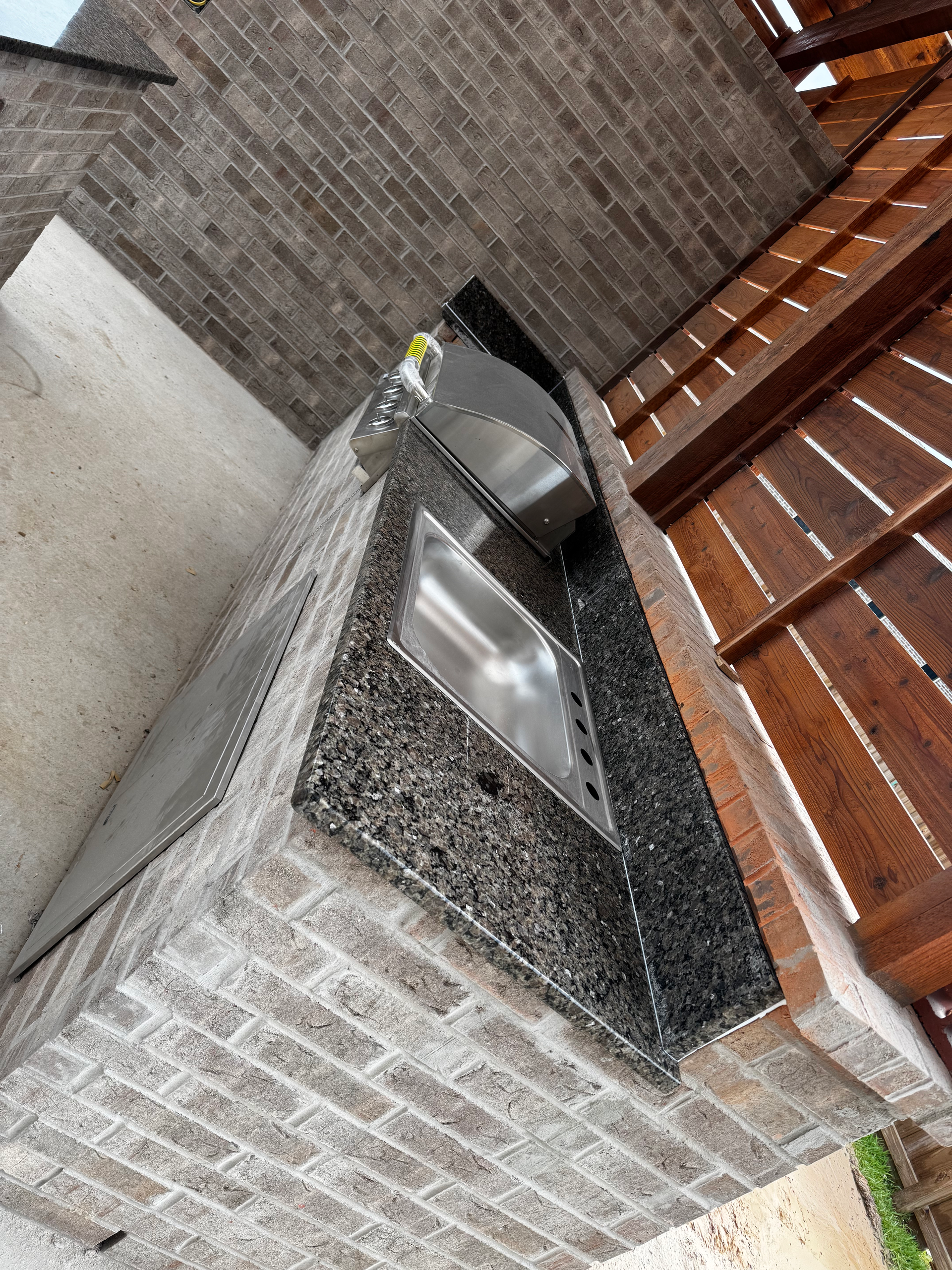 A kitchen with stainless steel appliances and white cabinets