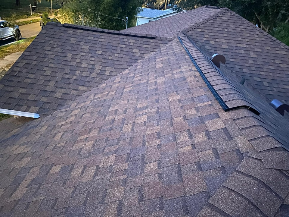 A close up of a roof with shingles on it.