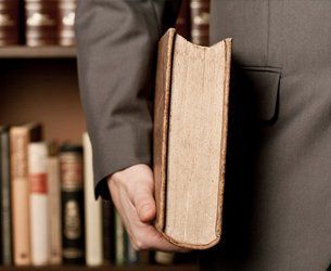 Attorney holding a book