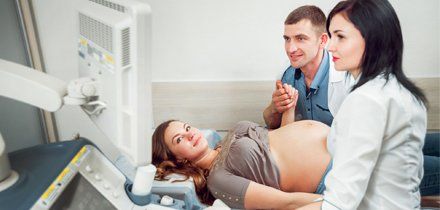 Couple talking to a doctor