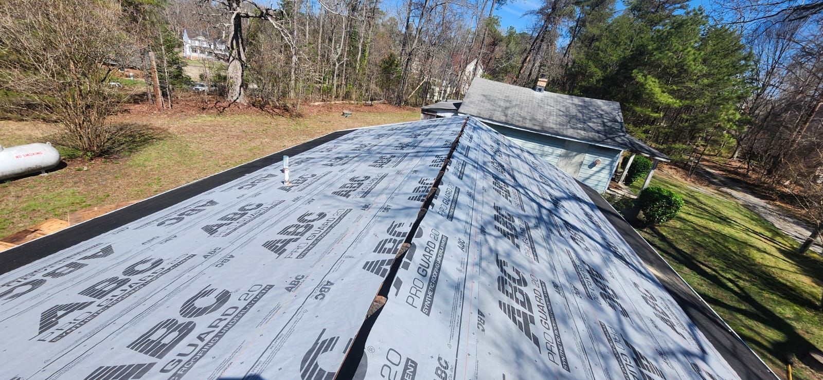 Roof with gray underlayment and 