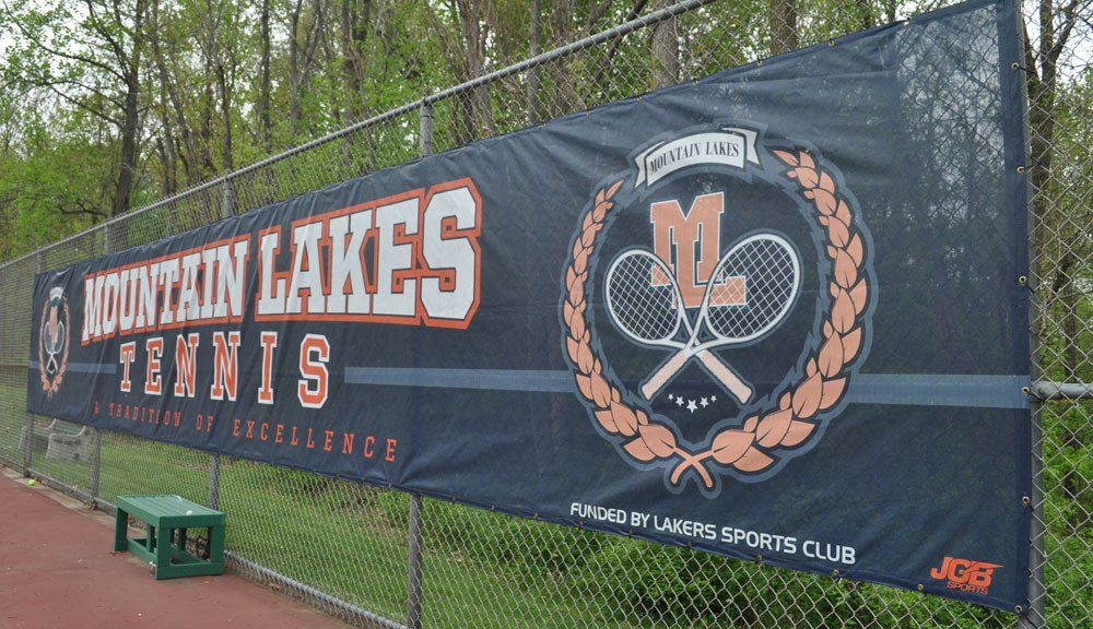 Baseball and softball walls - with custom windscreens or wall padding