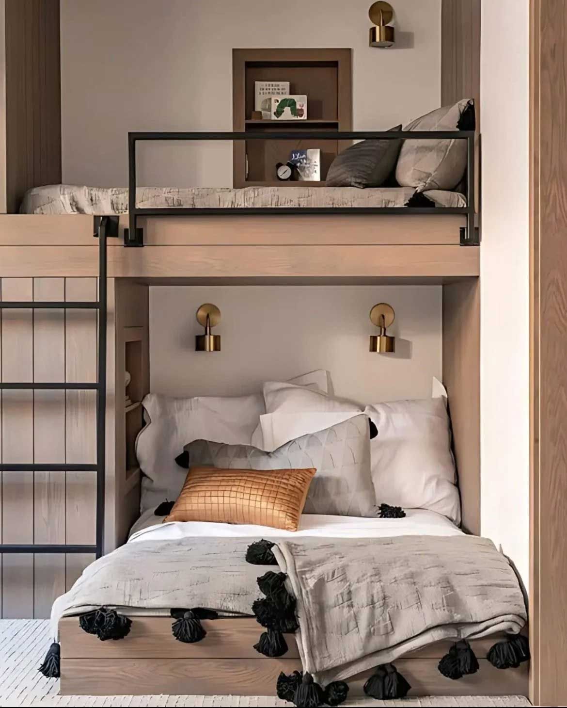Bunk bed in neutral tones with a top bunk, ladder, and decorative pillows.