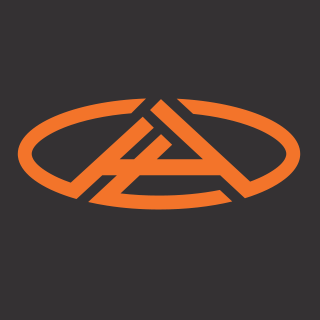 An orange and black logo on a black background