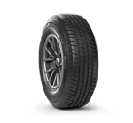 A close up of a car tire on a white background.