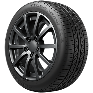 A close up of a tire that says tiger paw on it