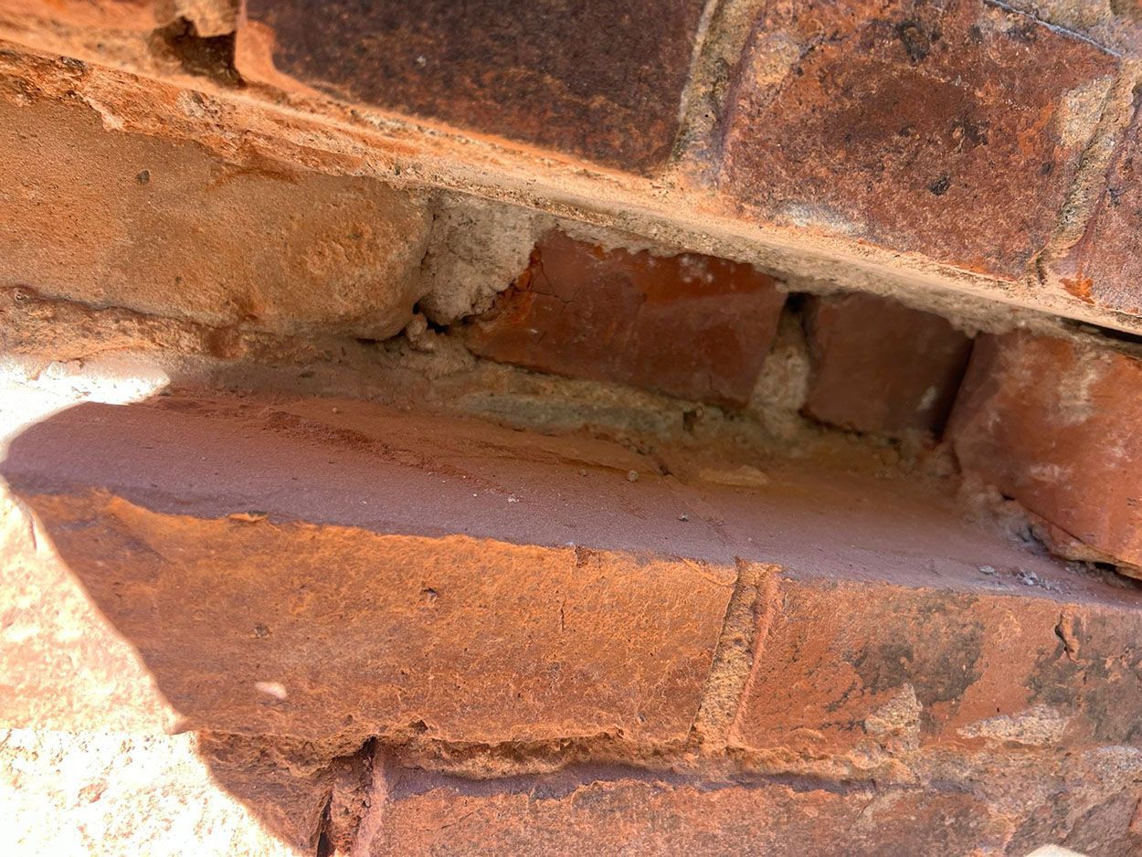A close-up of an old brick wall