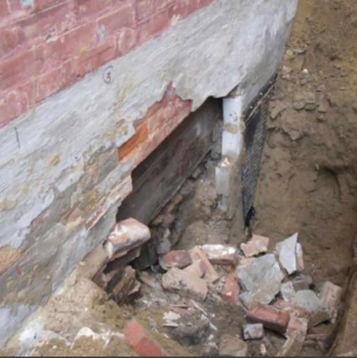 A brick wall being repaired