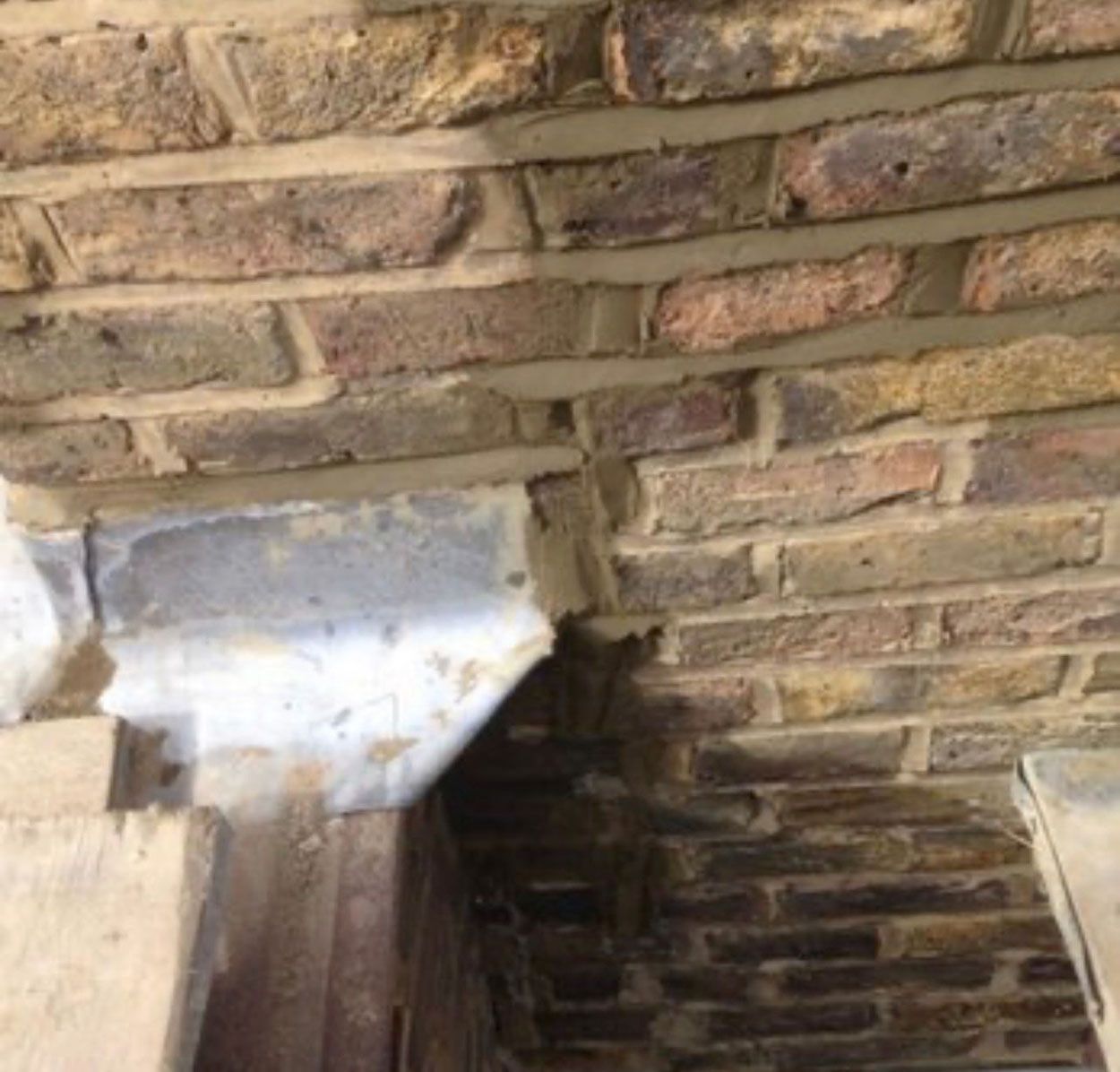 Water is leaking on a brick wall