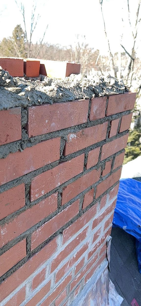 A chimney being repaired