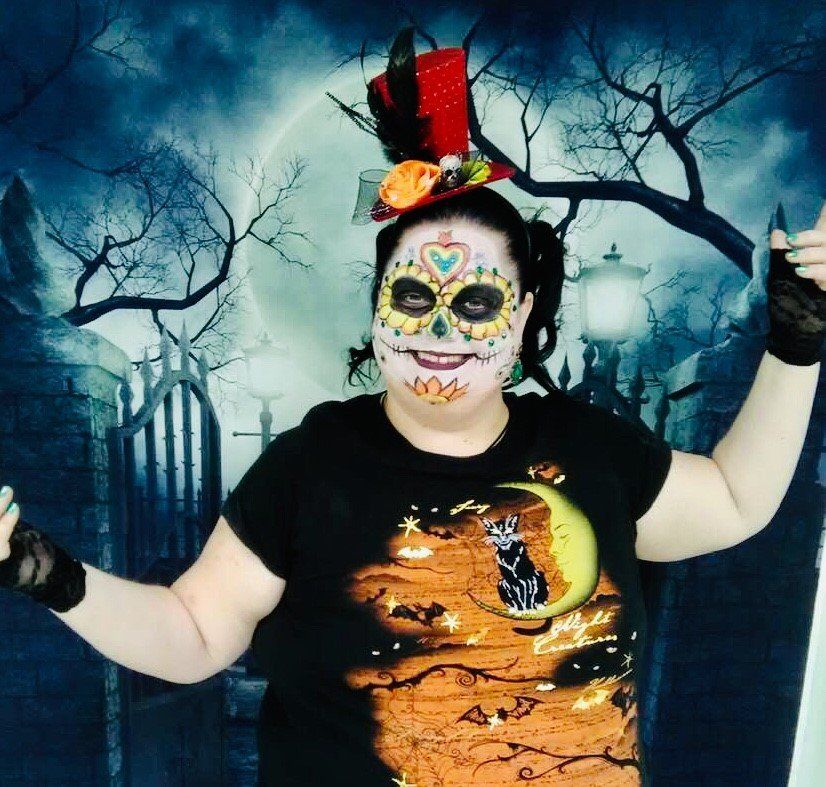 a lady with her face painted