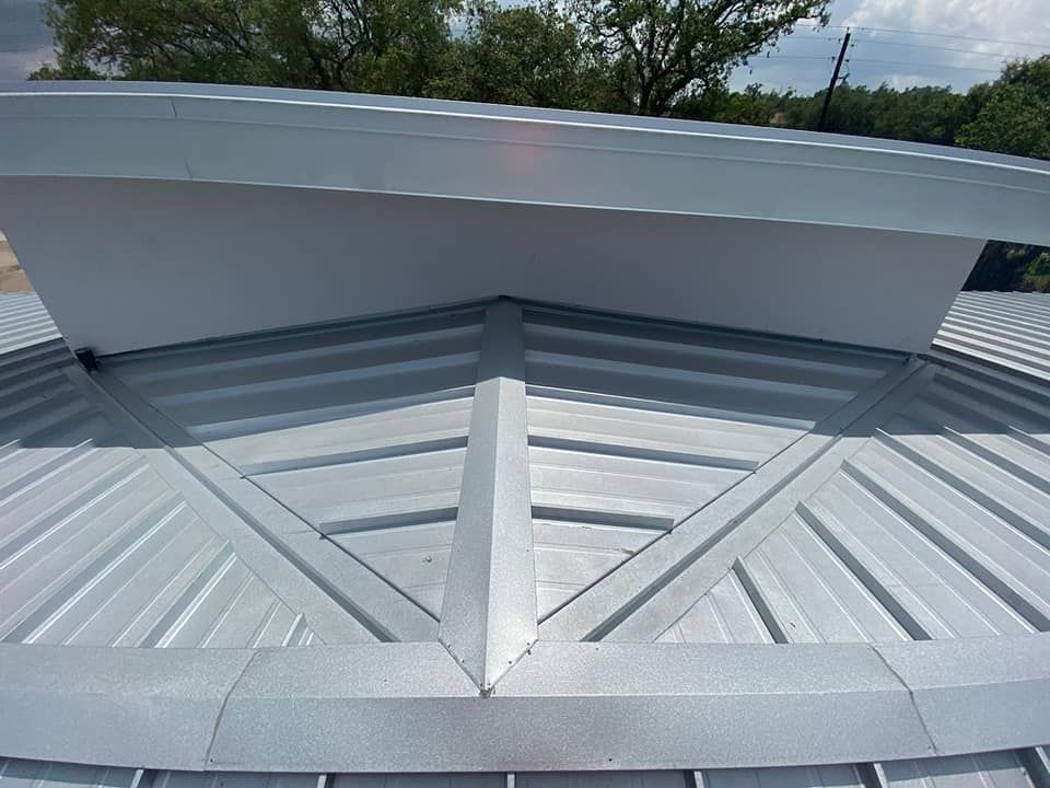 The roof of a building has a geometric design on it