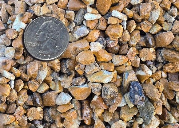 Meramec gravel in tan and gray, labeled sizes 3/4