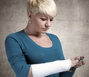 A woman with an injured arm