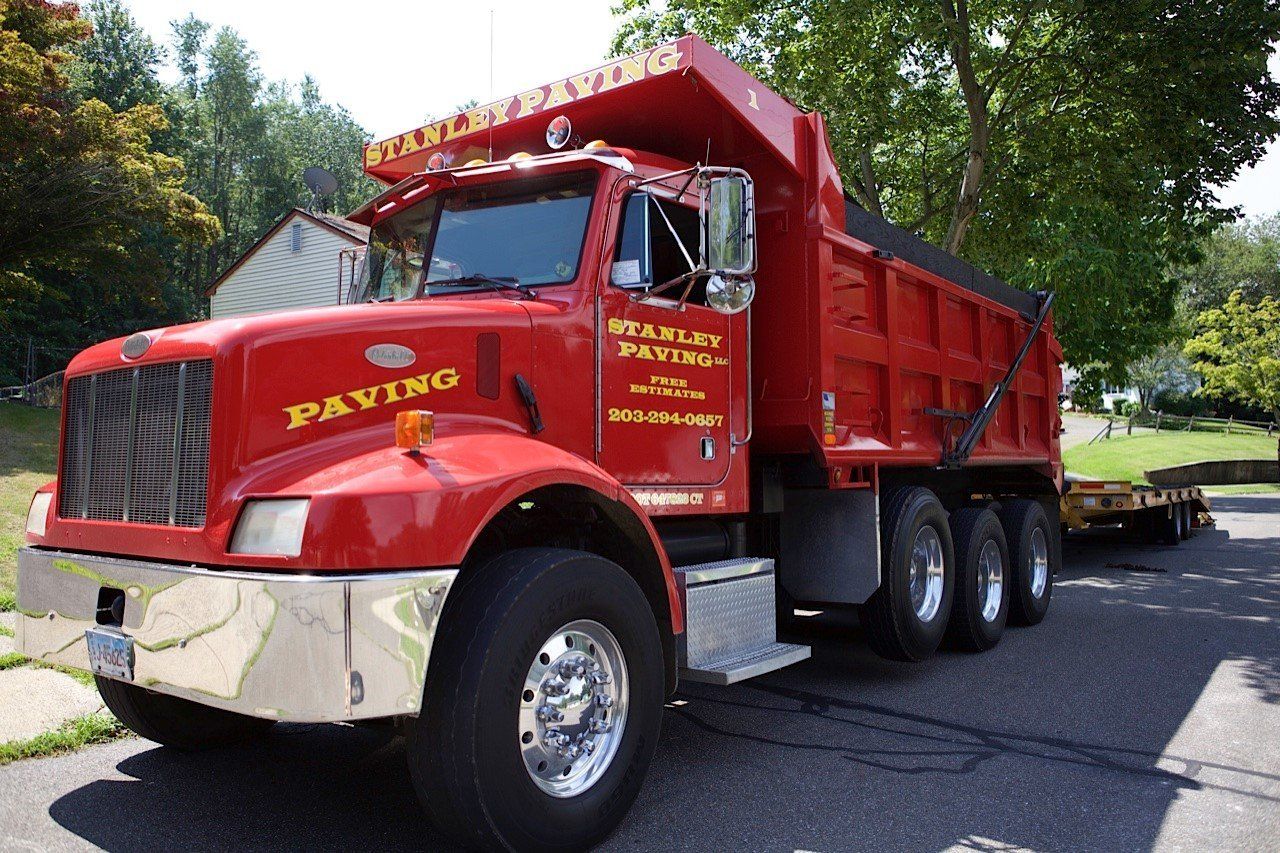 A red dump truck with 