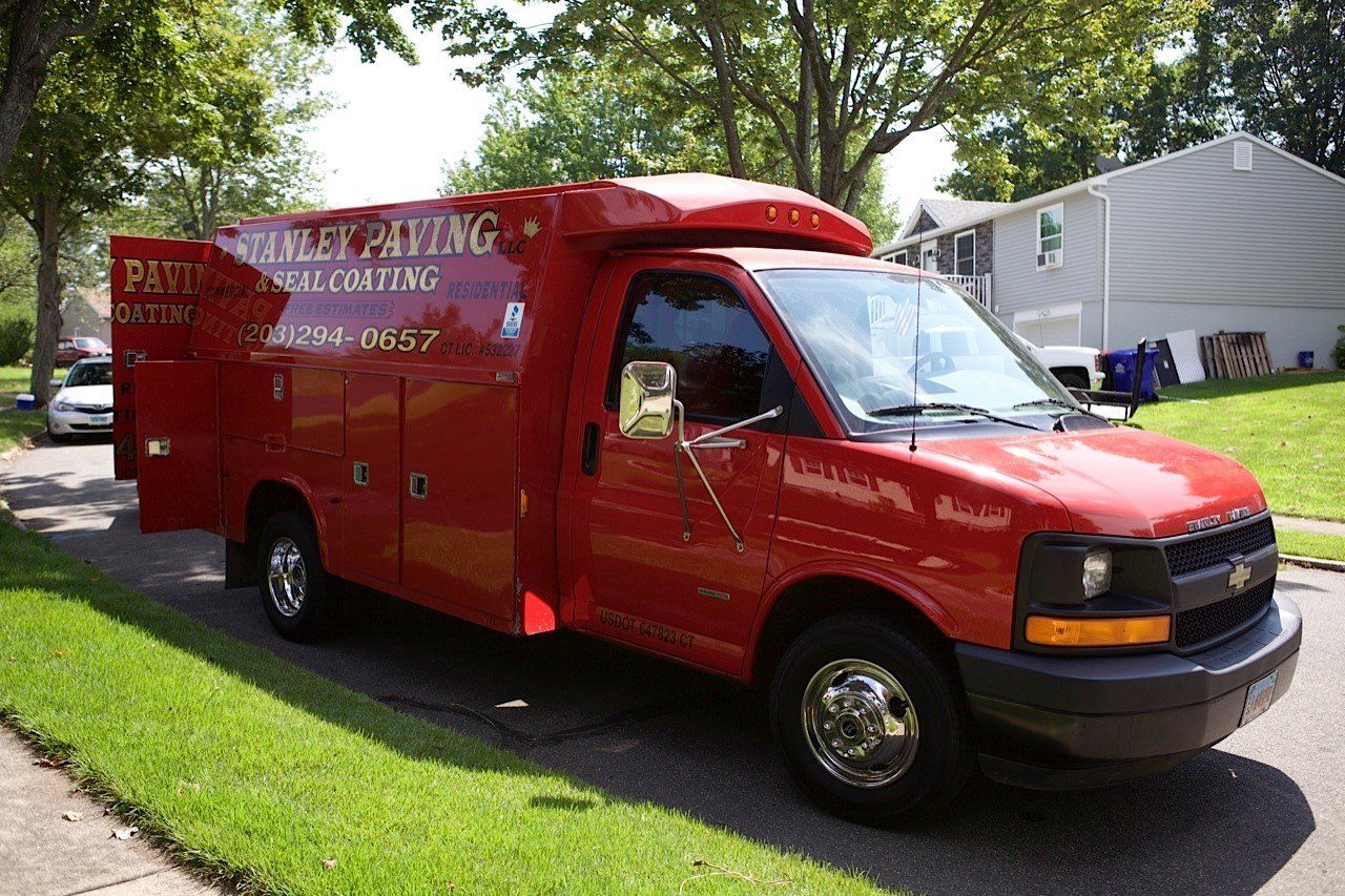 A bright red utility service truck for 