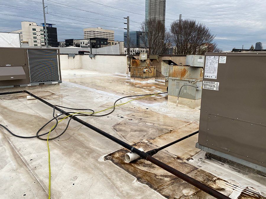 Before photo commercial roof - roofing contractor