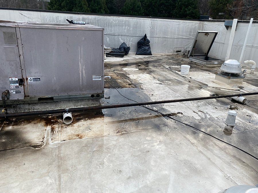 Before photo commercial roof - roofing contractor