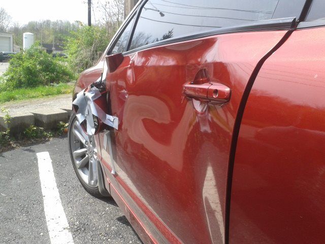 Car dented part before repair