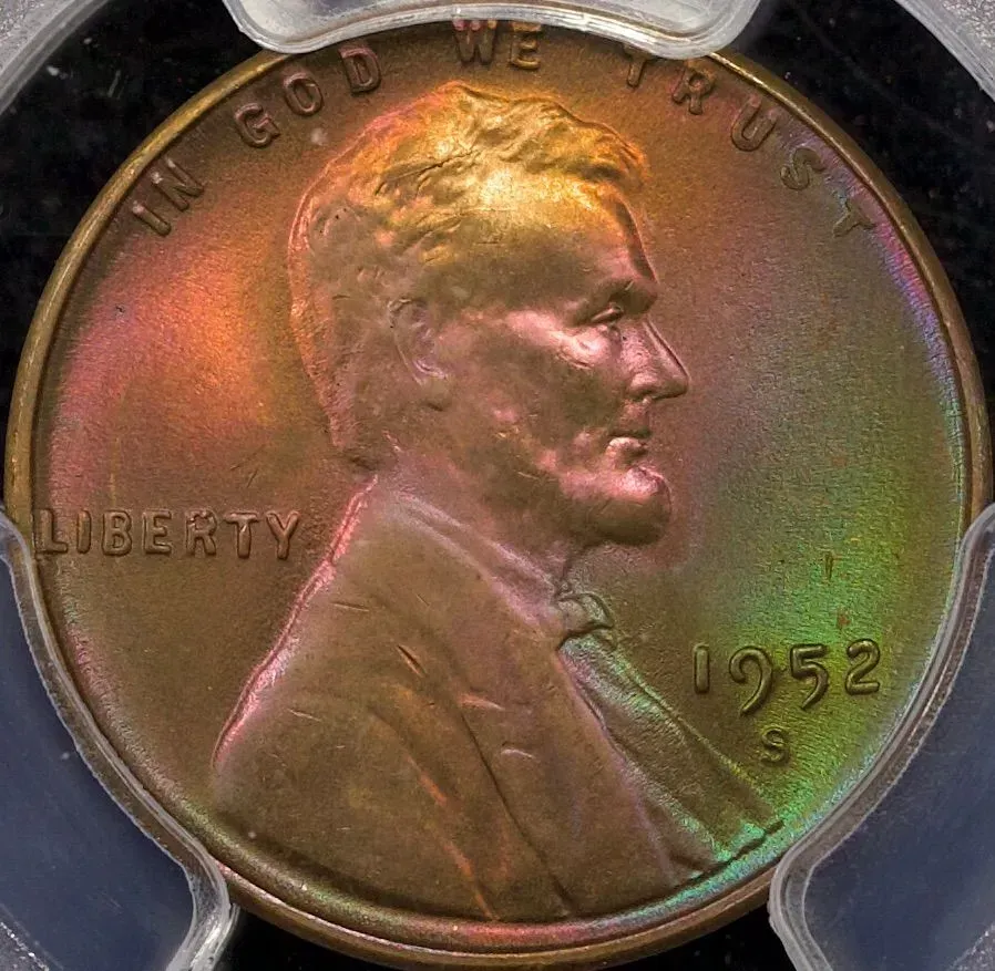 Close-up of a copper 1952 Lincoln penny in a clear holder, showing the profile and “LIBERTY” text.