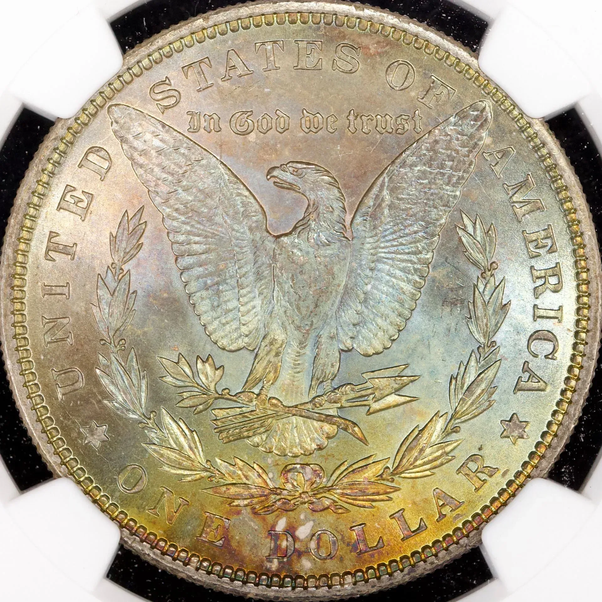 1878 United States trade dollar coin with an eagle and the motto “In God We Trust”