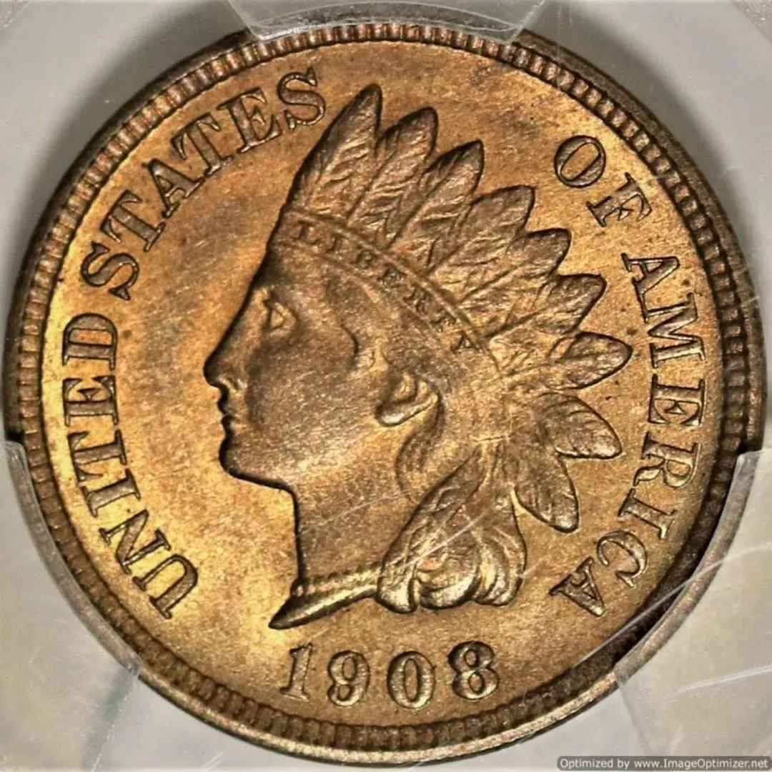 Close-up of a 1908 United States Indian Head penny on a neutral background