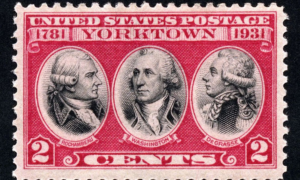Red U.S. postage stamp with three cameo portraits and “Yorktown 1781” text