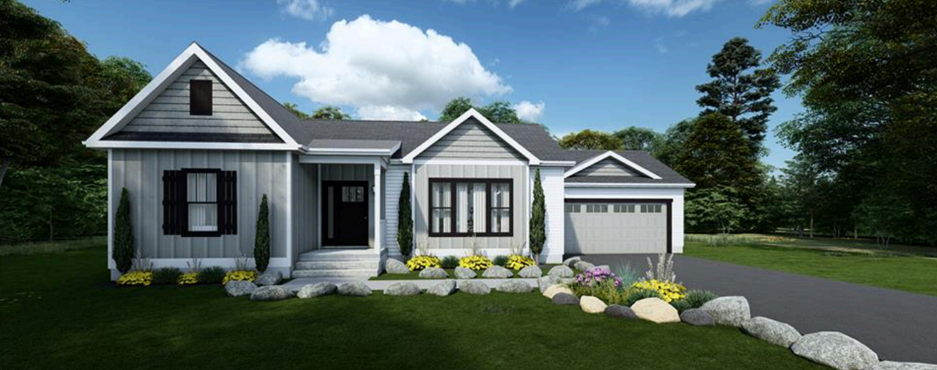 Modern gray house with white trim, front lawn, stone path, and attached garage under a blue sky.