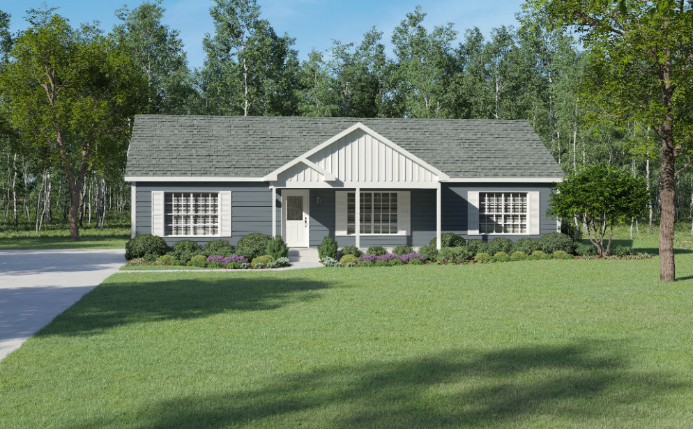 Single-story gray house with white trim and a front porch, set in a grassy yard with trees behind it.