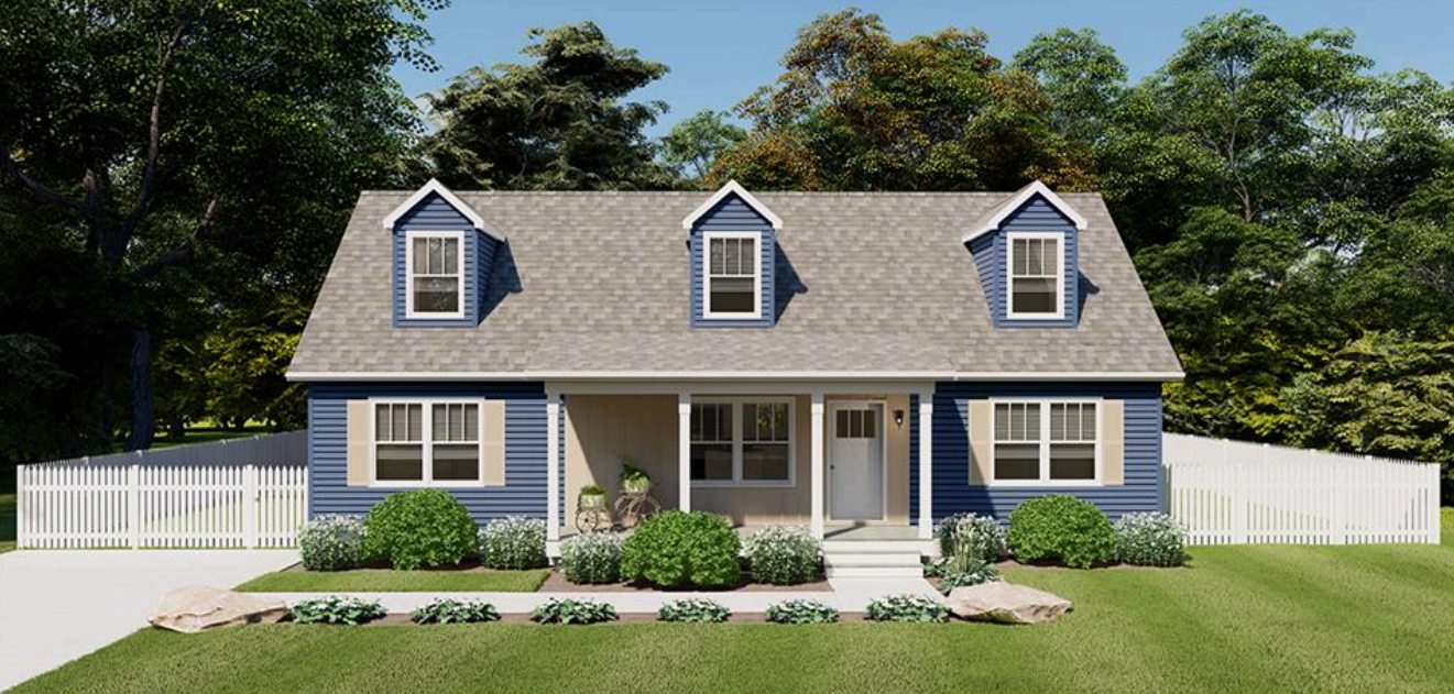 Blue house with white trim, dormer windows, and a front lawn, bordered by a white picket fence.