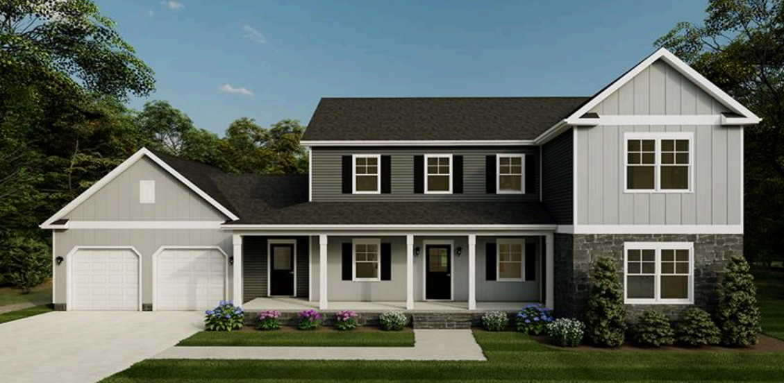 Two-story gray house with white trim, front porch, garage, and landscaped yard.