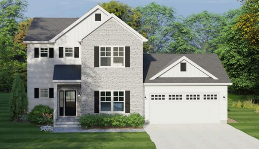 Two-story gray stone house with white trim and attached two-car garage in a landscaped suburban setting.