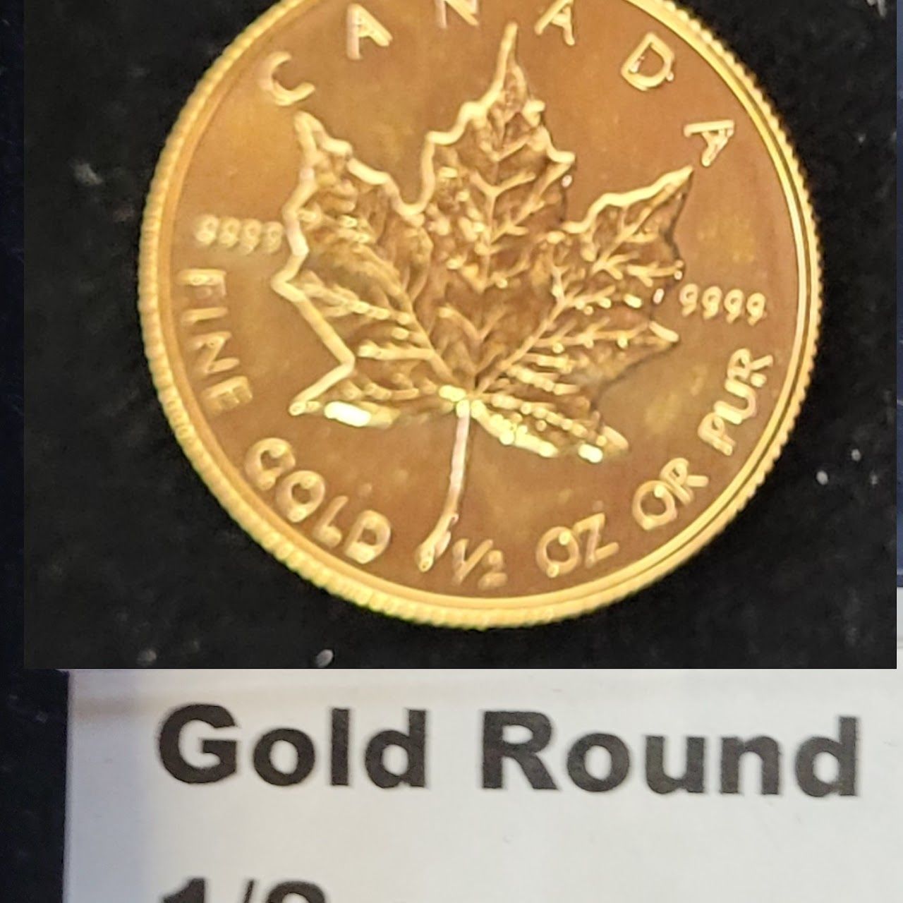 Gold coin featuring a maple leaf; 
