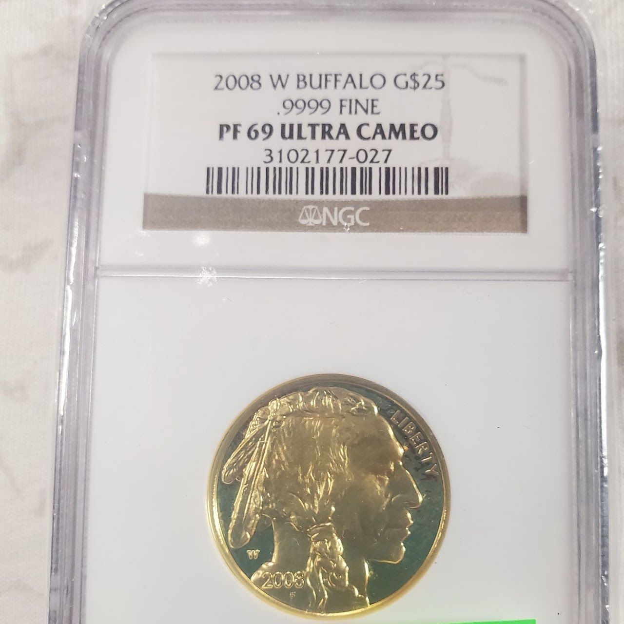 Gold coin, 2008 W Buffalo, graded PF69 Ultra Cameo in NGC holder.