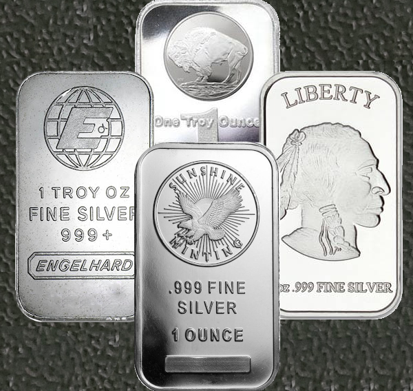 Silver bullion bars with various designs and markings, including 