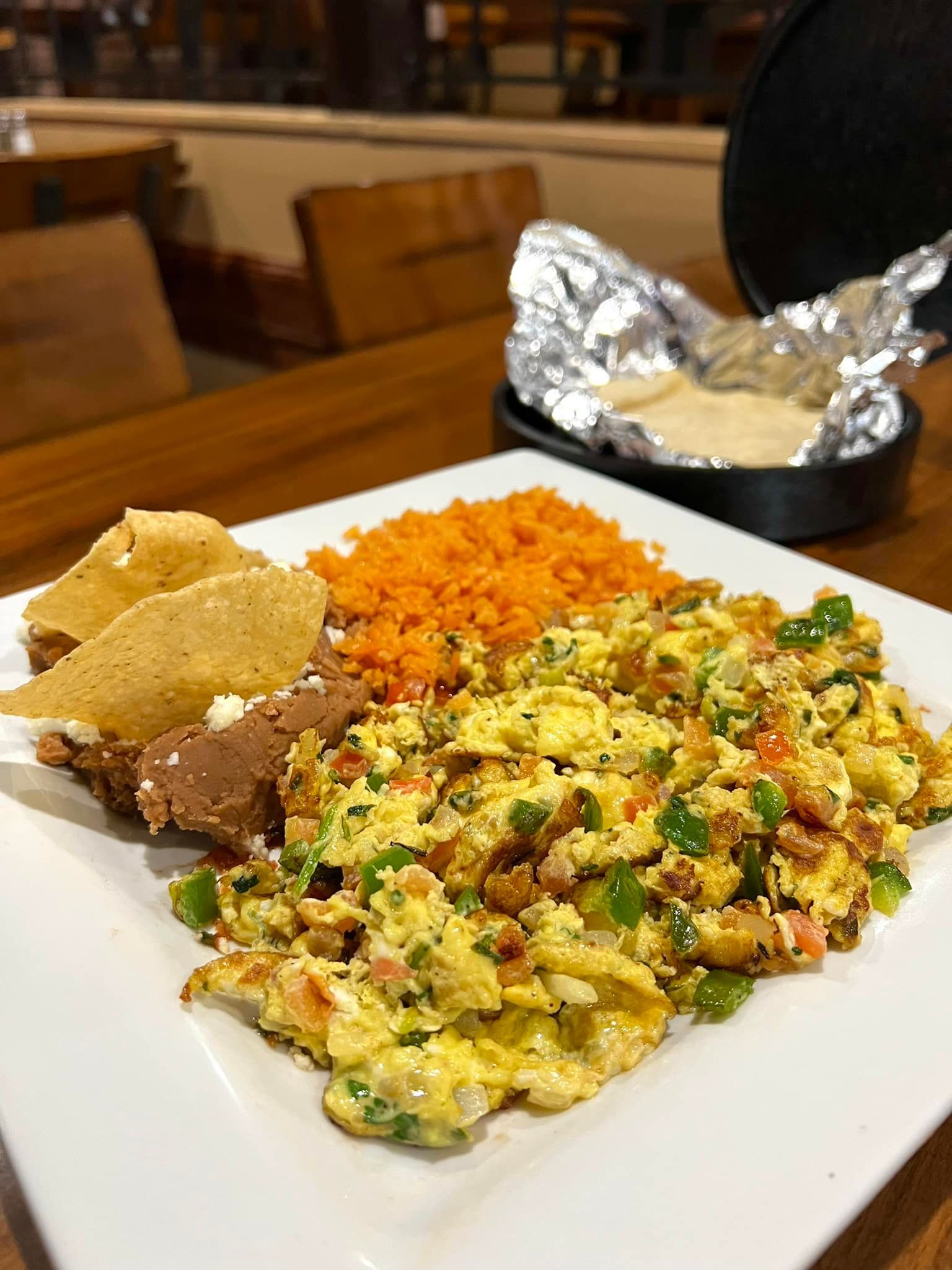 A close up of a plate of food on a table.