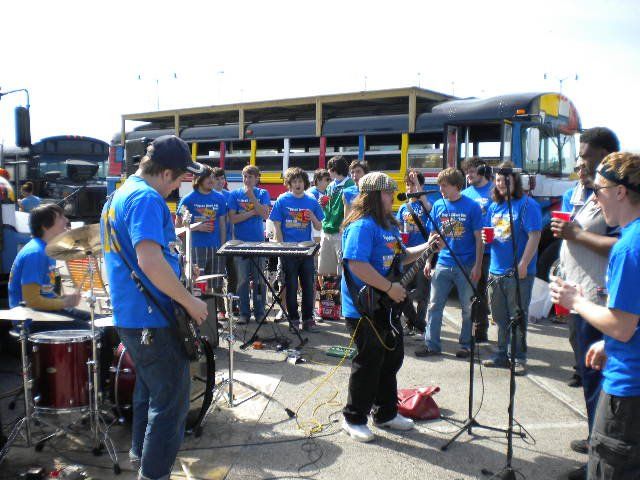 Band playing by the party bus