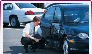 Insurance person inspecting car