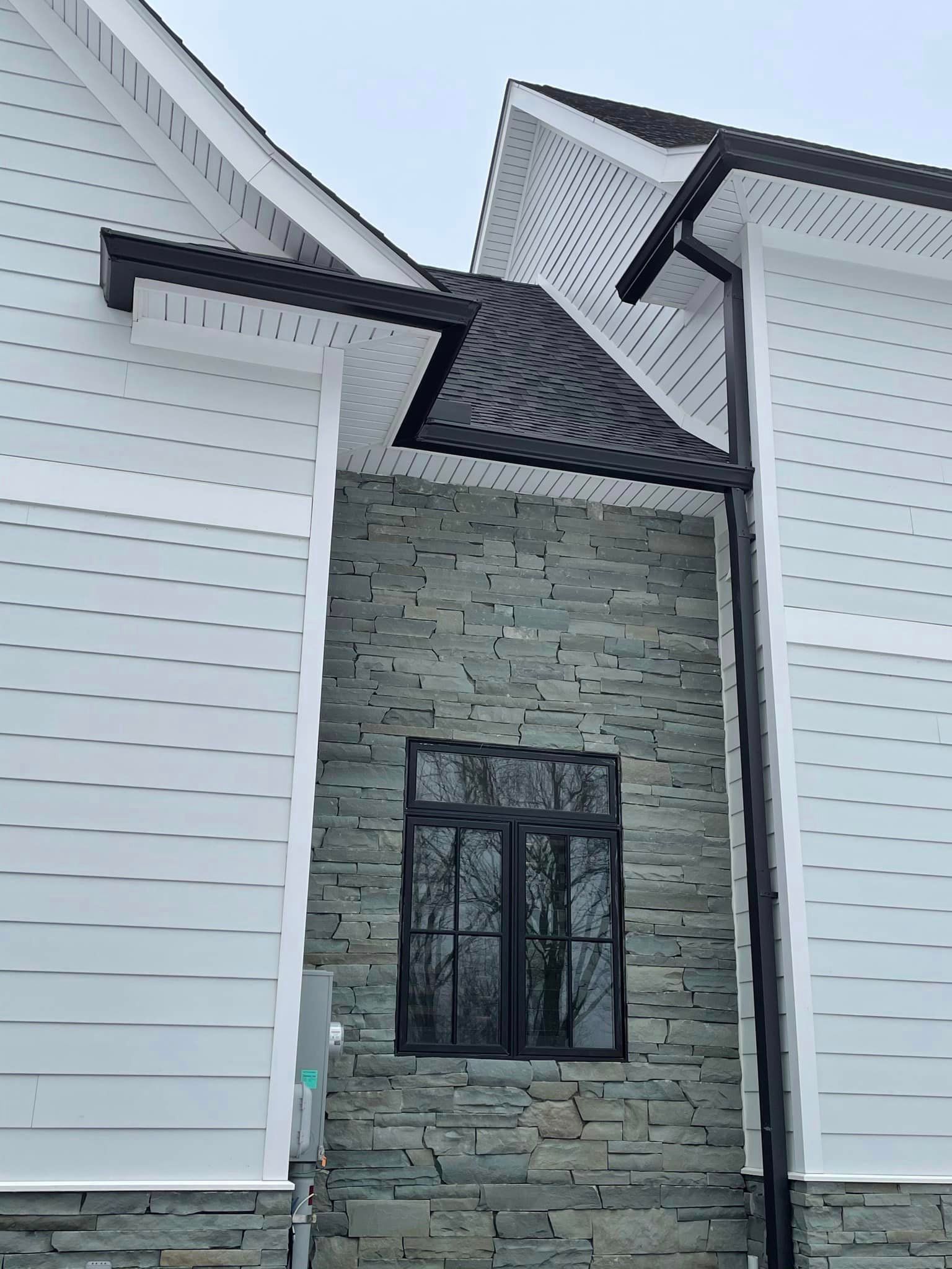 black gutter and windows