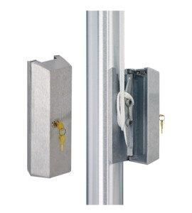 a stainless steel pole lock with two keys attached to it .