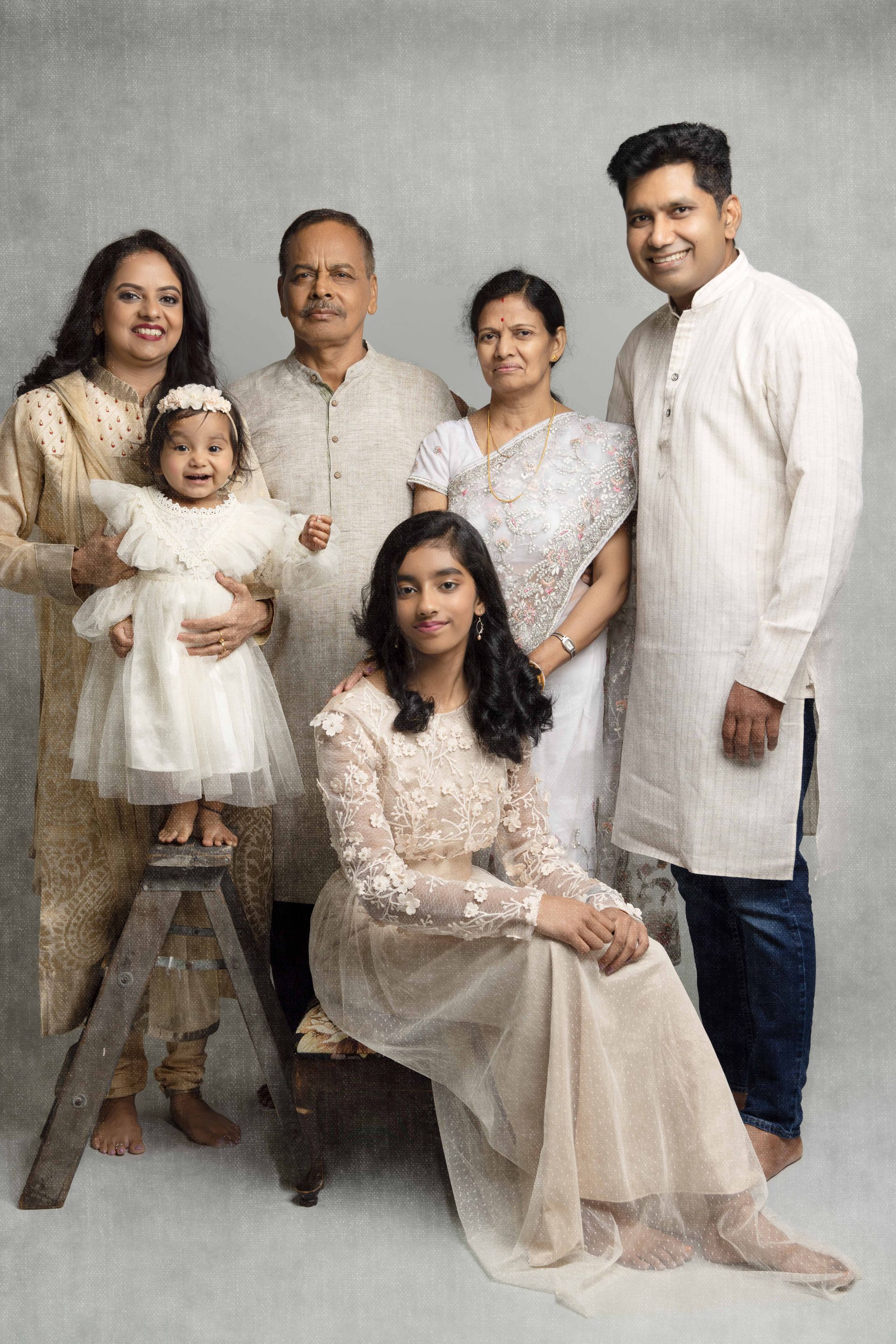 A group of people are posing for a picture together.